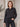 Gestreepte damesblouse met glinsterende details - Zwart